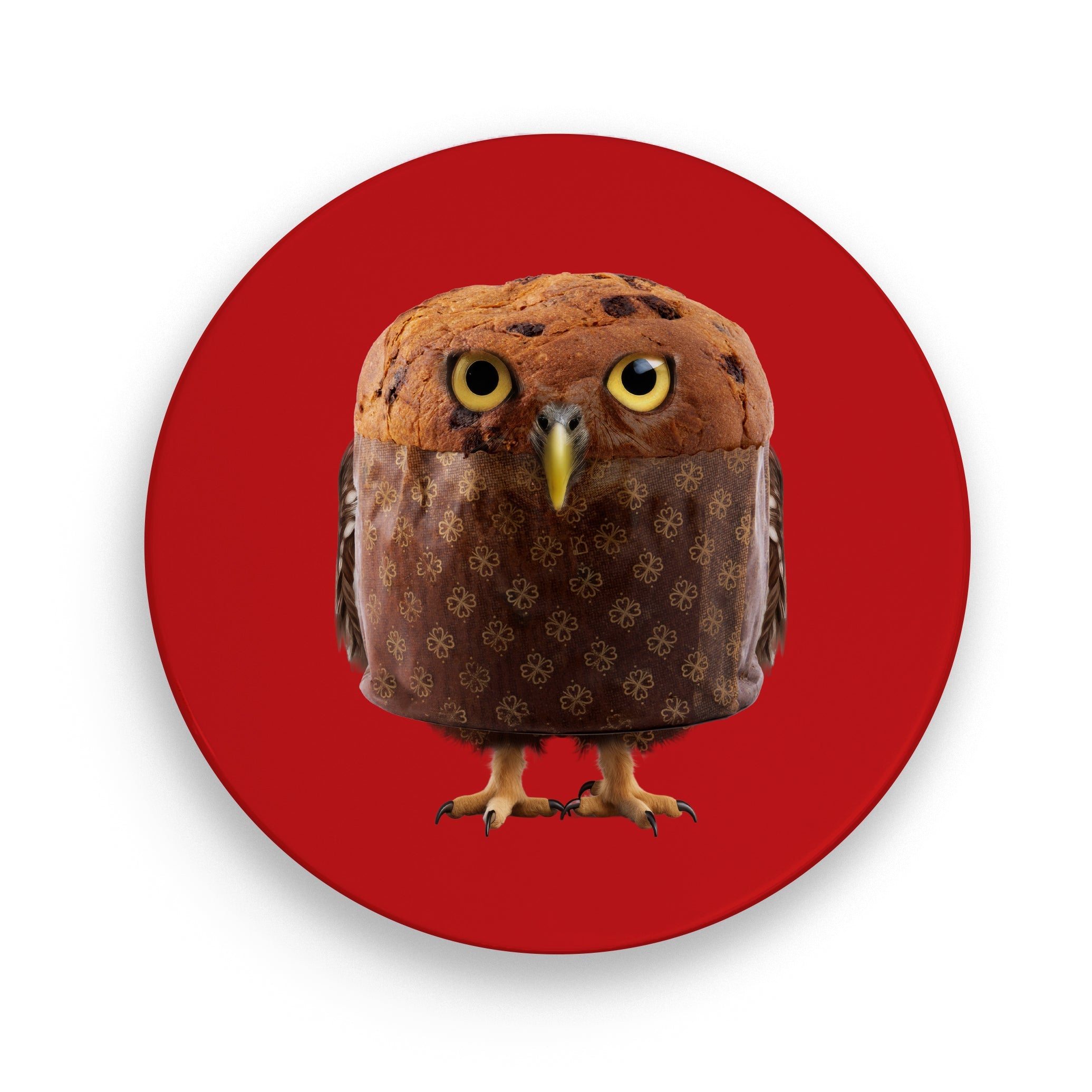 Piatto panettone in porcellana colorata di rosso. la fantasia rappresenta un gufo con la livrea di panettone